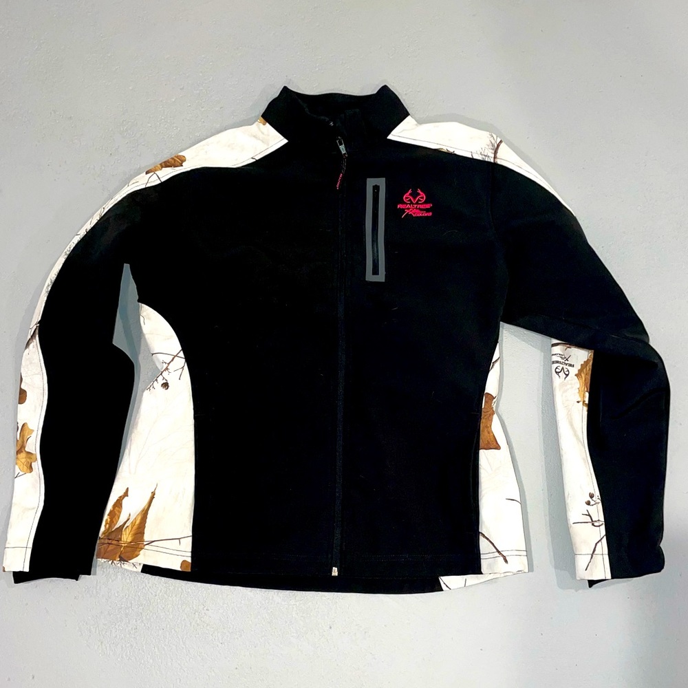 Realtree camouflage jacket is waterproof. Comes in a size medium for women.
